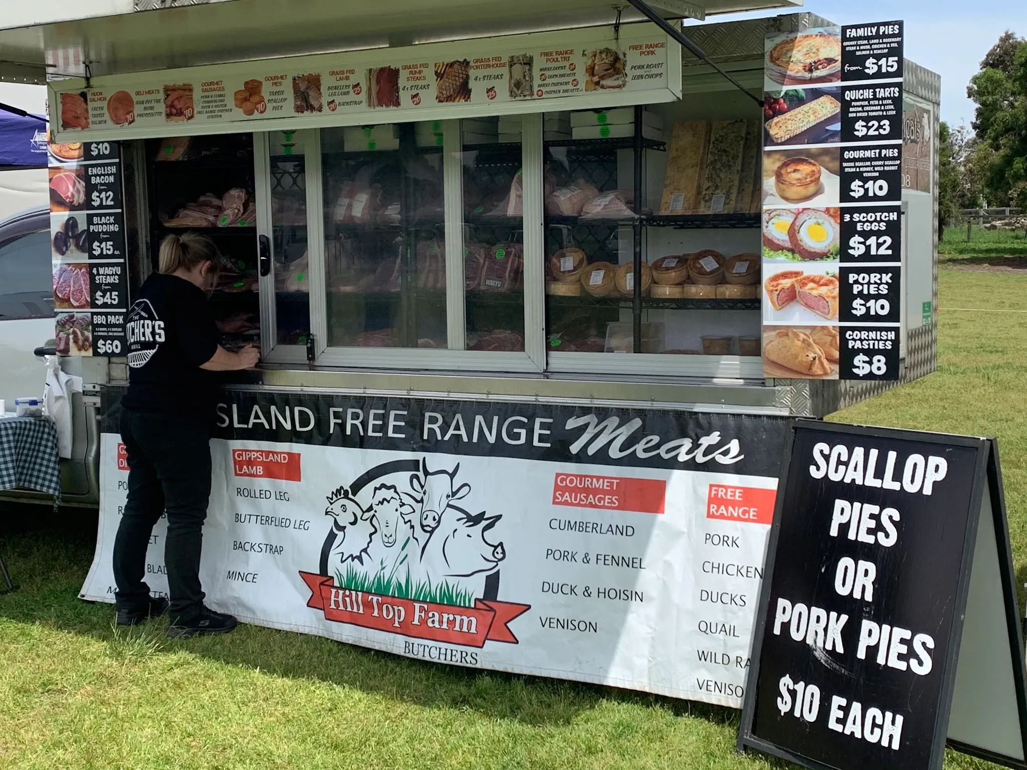 Hill Top Farm Butchers farmers market van with Gippsland Free Range Meats branding and pie display